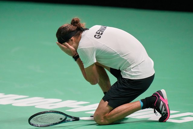 Germany's Alexander Zverevreacts kneels after missing a point against Argentina's Francisco Cerundolo during a Davis Cup quarterfinal singles tennis match between Germany and Argentina, in Bologna, Italy, Thursday, November 20, 2025. (Photo by Luca Bruno/AP Photo)