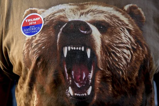 An image of a bear is seen on the clothing of Republican U.S. presidential candidate Donald Trump supporter Ray "Bear" McCook, as he makes his way into the Macon Coliseum before a Trump for President campaign rally in Macon, Georgia November 30, 2015. McCook says he is voting for Trump because, "America needs to go in a different direction". (Photo by Christopher Aluka Berry/Reuters)