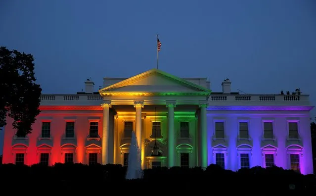 The White House is illuminated in rainbow colors after an historic Supreme Court ruling legalizing gay marriage in Washington, United States June 26, 2015. (Photo by Gary Cameron/Reuters)
