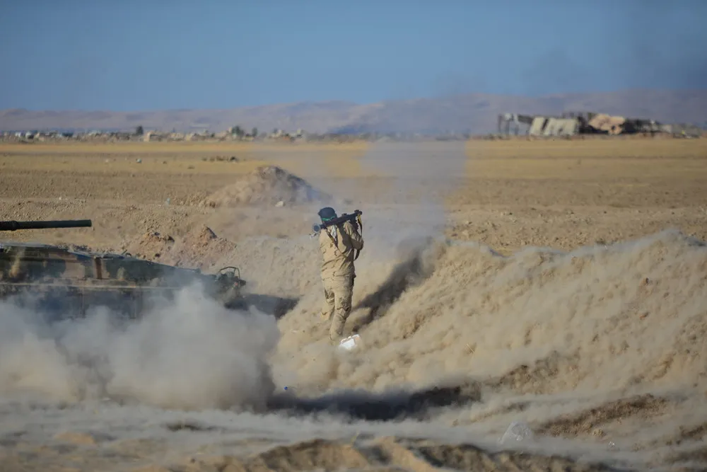 Iraqis Flee Mosul Fighting