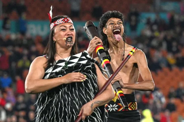 Maori performers are seen during a ceremony prior to the Australia and New Zealand 2023 Women's World Cup Group C football match between Costa Rica and Zambia at Waikato Stadium in Hamilton on July 31, 2023. (Photo by Saeed Khan/AFP Photo)