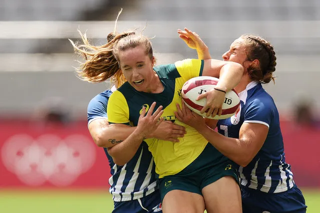 Tia Hinds of Team Australia is tackled in the Women’s Placing 5-8 match between Team ROC and Team Australia during the Rugby Sevens on day eight of the Tokyo 2020 Olympic Games at Tokyo Stadium on July 31, 2021 in Chofu, Tokyo, Japan. (Photo by Dan Mullan/Getty Images)