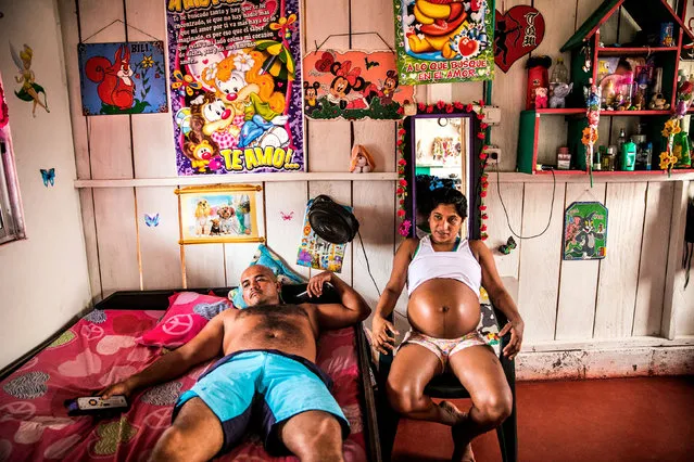 Being pregnant after Farc child-bearing ban, by Catalina Martin-Chico. Yorladis is pregnant for the sixth time, after five other pregnancies were terminated during her Farc years in Colombia. She says she managed to hide the fifth pregnancy from her commander until the sixth month by wearing loose clothes. Yorladis and her partner live in a house in a temporary camp in Colinas. (Photo by Catalina Martin-Chico/Panos/World Press Photo 2019)
