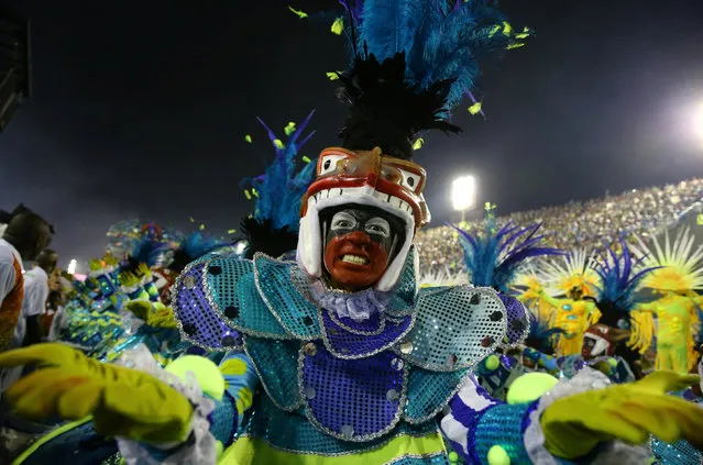 Revellers from the Grande Rio samba school perform during the carnival parade at the Sambadrome in Rio de Janeiro, Brazil, February 27, 2017. (Photo by Pilar Olivares/Reuters)