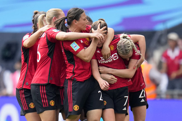 Manchester United's Ella Toone, 2nd right, celebrates with her teammates after scoring the opening goal during the Women's FA Cup final soccer match between Manchester United and Tottenham Hotspur at Wembley Stadium in London, Sunday, May 12, 2024. (Photo by Kirsty Wigglesworth/AP Photo)