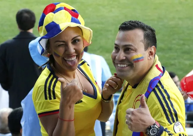 Colombia fans cheer as they await the start of the team's Copa America 2015 quarter-finals soccer match against Argentina at Estadio Sausalito in Vina del Mar, Chile, June 26, 2015. (Photo by Rodrigo Garrido/Reuters)