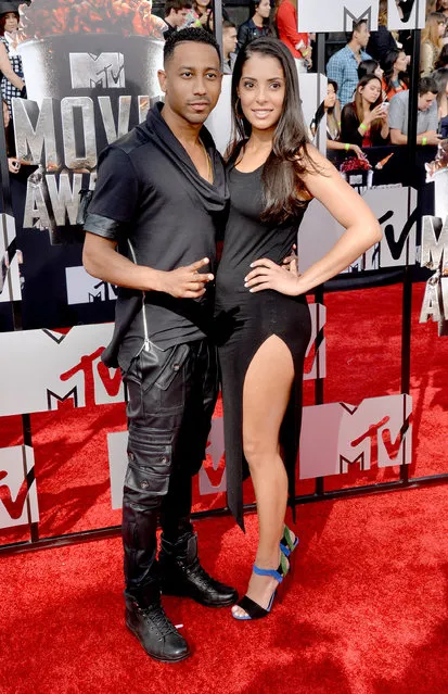 Comedian Brandon T. Jackson and guest attend the 2014 MTV Movie Awards at Nokia Theatre L.A. Live on April 13, 2014 in Los Angeles, California. (Photo by Michael Buckner/Getty Images)