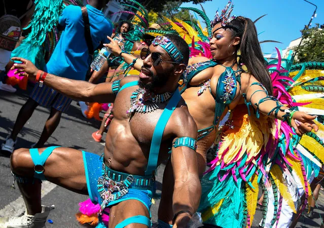 Revellers take part in the Notting Hill Carnival in London, Britain on August 26, 2019. (Photo by Toby Melville/Reuters)