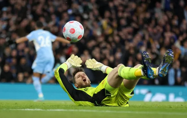 Manchester United's David de Gea looks dejected after Manchester City's Riyad Mahrez scores their third goal at Etihad Stadium, Manchester, Britain on March 6, 2022. (Photo by Carl Recine/Action Images via Reuters)