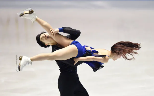 Wang Shiyue (R-in blue) and Liu Xinyu (L) of China skate during their short dance in the ice dance event at the World Team Trophy figure skating competition in Tokyo on April 20, 2017. (Photo by Toru Yamanaka/AFP Photo)