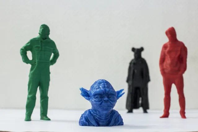 A picture shows figures that were created by means of 3D printing in Berlin, January 7, 2013. The figures are 3D printed representations of the original models that were recorded with 3D scanning technology by Gismo at the Raumfahrtagentur hacker space in Berlin. (Photo by Thomas Peter/Reuters)
