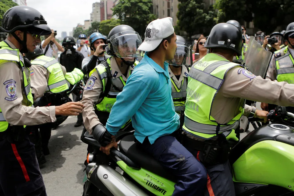 Anti-Government Protesters Clash with Police in Venezuela