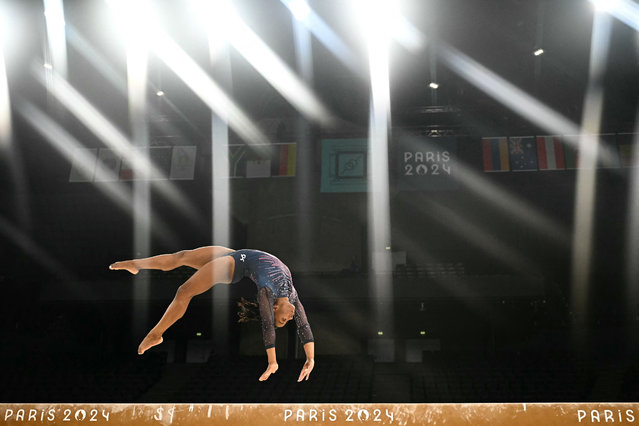 US' Simone Biles takes part in an artistic gymnastics training session at the Bercy Arena in Paris on July 25, 2024, ahead of the Paris 2024 Olympic Games. (Photo by Loic Venance/AFP Photo)