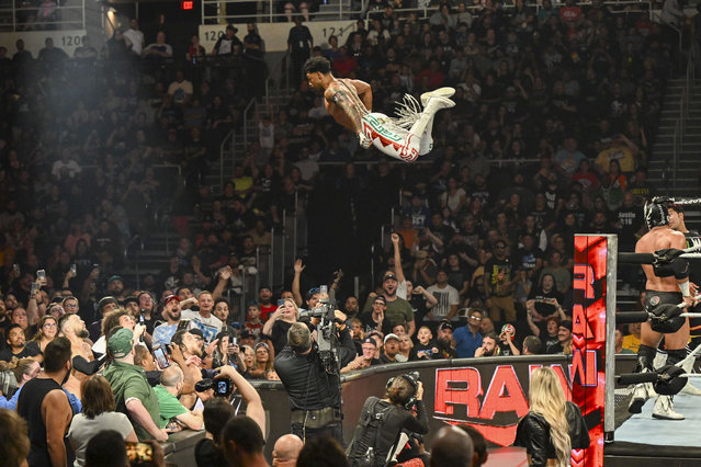 Joaquin Wilde assisted rope launch dive against The Judgment Day during Monday Night RAW at Amica Mutual Pavillion on August 26, 2024 in Providence, Rhode Island. (Photo by WWE/Getty Images)