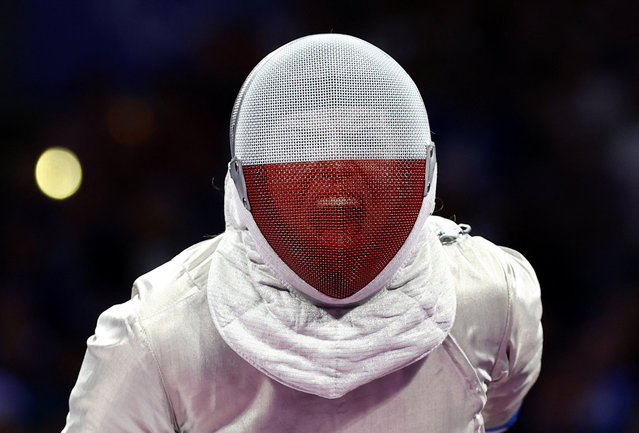 Kinga Drozdz of Poland reacts during her bout against Eva Andrea Hajmasi of Hungary during women's sabre category A semifinal in Paris, France on September 3, 2024. (Photo by Kacper Pempel/Reuters)