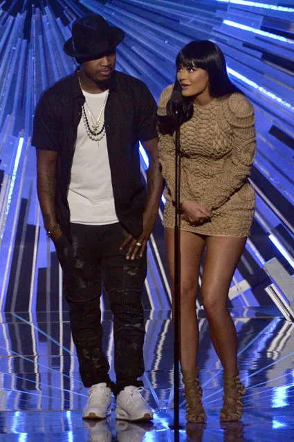 Singer Ne-Yo (L) and TV personality Kylie Jenner speak onstage during the 2015 MTV Video Music Awards at Microsoft Theater on August 30, 2015 in Los Angeles, California. (Photo by Lester Cohen/WireImage)