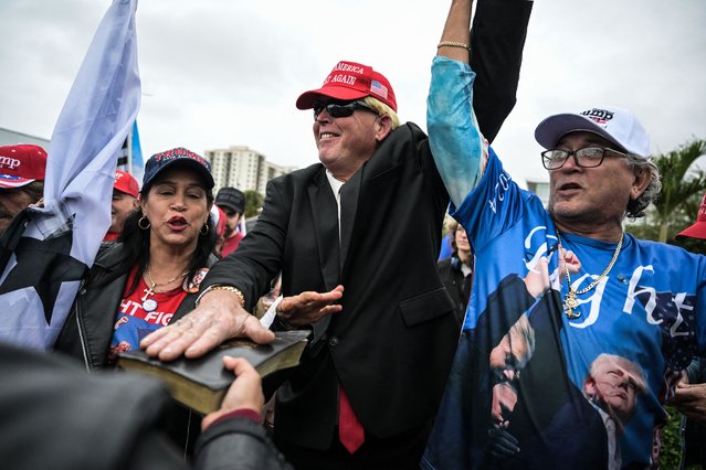 Supporters of US President-elect Donald Trump celebrate as they watch his inauguration ceremony in Miami, Florida, on January 20, 2025. (Photo by Chandan Khanna/AFP Photo)
