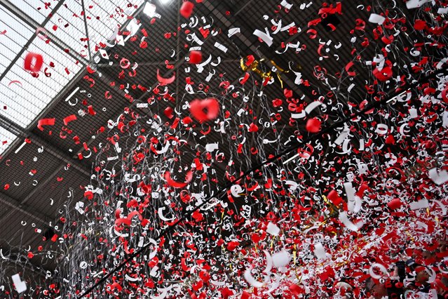 Confetti is thrown on Mainz' fans prior to the German first division Bundesliga football match between 1 FSV Mainz 05 and Eintracht Frankfurt in Mainz, western Germany on May 4, 2025. (Photo by Kirill Kudryavtsev/AFP Photo)