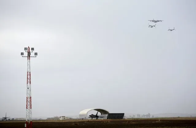 Spanish Air Force Hercules flies ahead U.S. Marine Ospreys during a military exercise in Moron military airbase, southern Spain October 6, 2015. (Photo by Marcelo del Pozo/Reuters)