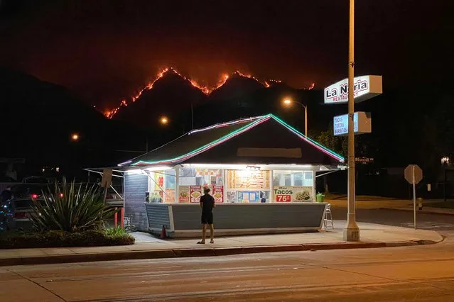The Bobcat Fire burns in the Angeles National Forest behind La Noria Restaurant in Monrovia, California, U.S. on September 10, 2020. The fire which started September 6th has burned 24,000 acres in the San Gabriel Canyon and is less than 10 percent contained. (Photo by David Swanson/Zuma/Imago)