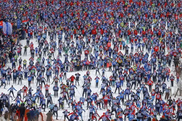 General view of the start of the traditional cross country skiing mass race “Ski-Track of Russia” in Khimki, outside Moscow, Russia, 11 February 2023. Thousands of people took part in the competition all around Russia. (Photo by Sergei Ilnitsky/EPA/EFE)