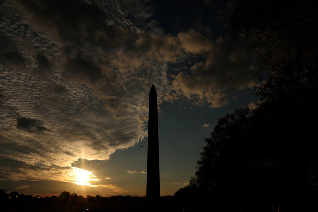 The Washington Monument at sunset, weeks into the continuing U.S. government shutdown, in Washington, D.C., U.S., October 26, 2025. (Photo by Kevin Coombs/Reuters)