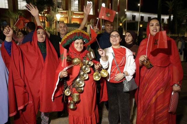 Moroccans celebrate the decision of the UN Security Council, which expressed its support for Morocco's autonomy plan for Western Sahara – a territory that has been disputed for half a century between Rabat and the independence-seeking Polisario Front, backed by Algeria, in the city of Rabat on Rabat, late on October 31, 2025. The UN Security Council voted on October 31, in favor of a resolution backing Morocco's autonomy plan for Western Sahara as the “most feasible” solution for the disputed territory, triggering celebrations in Rabat but angering Algeria. (Photo by Abdel Majid Bziouat/AFP Photo)
