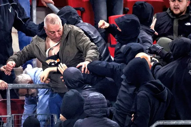 Supporters attack relatives of West Ham United players during the Conference League match between AZ Alkmaar v West Ham United at the AFAS Stadium on May 18, 2023 in Alkmaar Netherlands (Photo by Angelo Blankespoor/Soccrates/Getty Images)