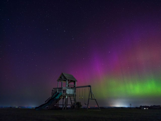 The aurora borealis made a rare appearance in the midwestern US state of Wisconsin on Sunday, September 14, 2025. (Photo by Ross Harried/NurPhoto/Rex Features/Shutterstock)