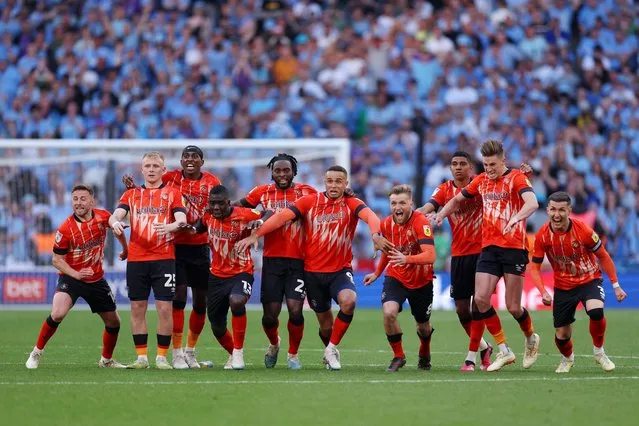 Players of Luton Town celebrate after Fankaty Dabo of Coventry City (not pictured) misses a penalty in the penalty shoot out which results in a promotion to the Premier League for Luton Town in the Sky Bet Championship Play-Off Final between Coventry City and Luton Town at Wembley Stadium on May 27, 2023 in London, England. (Photo by Richard Heathcote/Getty Images)