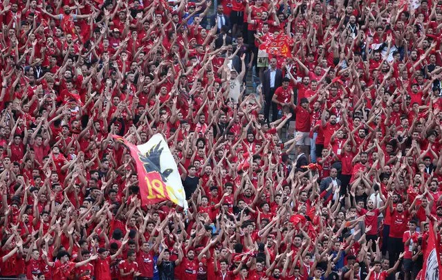 Al-Ahly fans cheer during the CAF Champions League final first leg soccer match between Al-Ahly and Wydad Casablanca in Cairo, Egypt, 04 June 2023. (Photo by Khaled Elfiqi/EPA)