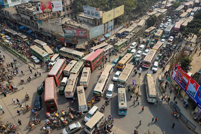 An aerial view of a busy street during a countrywide dawn to dusk strike called by the Jamaat e-Islami, in Dhaka, Bangladesh, 07 January 2016. Jamaat enforced the shutdown in protest against the death penalty of their chief leader Motiur Rahman Nizami who is convicted for his crimes during the liberation war against Pakistan in 1971. (Photo by Abir Abdullah/EPA)