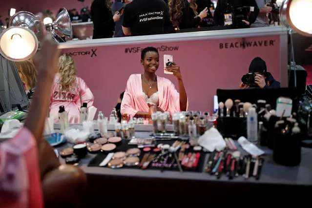 Model Maria Borges gets ready backstage before the Victoria's Secret Fashion Show at the Grand Palais in Paris, November 30, 2016. (Photo by Benoit Tessier/Reuters)