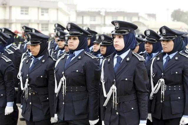 Policewomen take part in a parade during a ceremony marking the Iraqi Police Day at a police academy in Baghdad January 9, 2016. (Photo by Khalid al Mousily/Reuters)