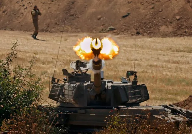 Israeli soldiers fire a 155mm self-propelled howitzer towards the Gaza Strip from their position along the border in the southern Israeli city of Sderot on May 20, 2021. Israel is studying whether conditions are right to stop bombing Palestinian militants in Gaza but is preparing for “more days” of strikes if necessary, an Israeli military source said today. Diplomats stepped up efforts today toward a ceasefire to stem 10 days of deadly violence between Israel and armed Palestinian groups in Gaza as air strikes again hammered targets in the enclave. (Photo by Jack Guez/AFP Photo)