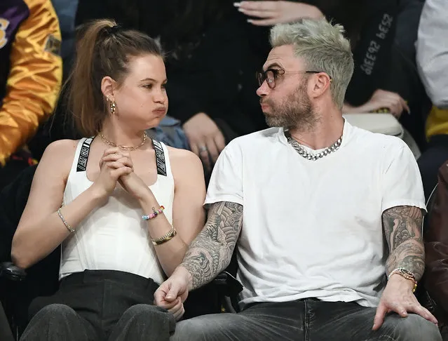 Model Behati Prinsloo and Adam Levine attend a basketball game between New Orleans Pelicans and Los Angeles Lakers at Staples Center on December 21, 2018 in Los Angeles, California. (Photo by Kevork S. Djansezian/Getty Images)