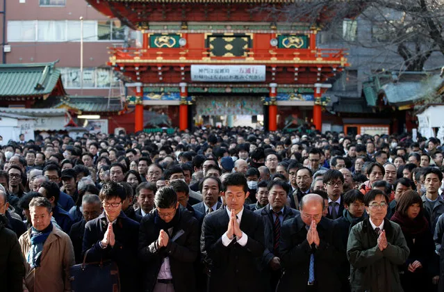 People offer prayers on the first business day of the year at the Kanda Myojin shrine, which is known to be frequented by worshippers seeking good luck and prosperous businesses, in Tokyo, Japan, January 4, 2017. (Photo by Toru Hanai/Reuters)