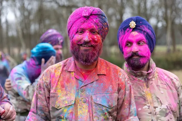 British Sikh soldiers covered in paint during Hola Mohalla, the annual Sikh military festival, which was celebrated by the Defence Sikh Network and the British Army at the Aldershot Garrison in Hampshire on March 19, 2024. (Photo by Richard Pohle/The Times)