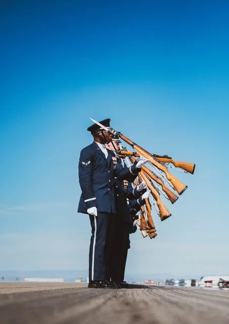 The U.S. Air Force Honor Guard conduct a drill on the flightline, March 22, 2024, at Luke Air Force Base Arizona. Both the Thunderbirds and the USAF Honor Guard underscore the highest standards of precision, representing the USAF's commitment to excellence and air superiority. (Photo by Airman 1st Class Katelynn Jackson/U.S Air Force Photo/Cover Images)