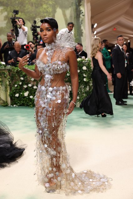 American singer-songwriter and rapper Janelle Monae poses at the Met Gala, an annual fundraising gala held for the benefit of the Metropolitan Museum of Art's Costume Institute with this year's theme “Sleeping Beauties: Reawakening Fashion” in New York City, New York, U.S., May 6, 2024. (Photo by Andrew Kelly/Reuters)