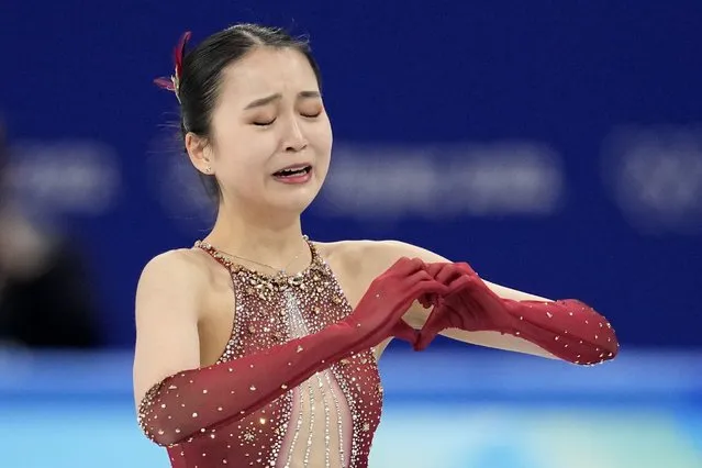 Zhu Yi, of China, reacts after the women's team free skate program during the figure skating competition at the 2022 Winter Olympics, Monday, February 7, 2022, in Beijing. (Photo by Natacha Pisarenko/AP Photo)