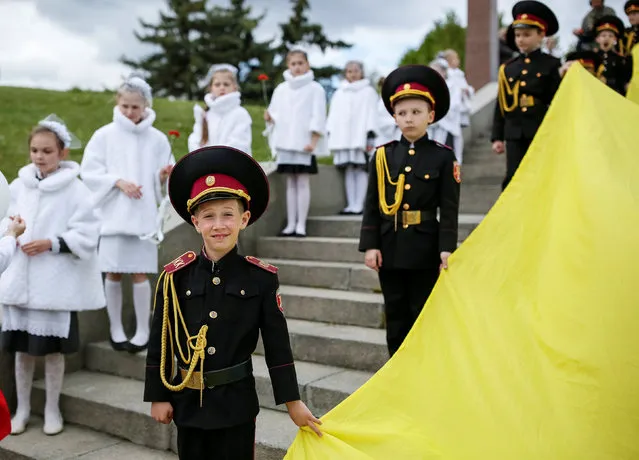 Young military cadets take part in a ceremony to mark the 71st anniversary of the victory over Nazi Germany in World War Two in the World War Two museum in Kiev, Ukraine, May 6, 2016. (Photo by Gleb Garanich/Reuters)