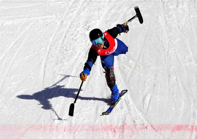 Japan's Hiraku Misawa competes in the men's super combined standing slalom event at the Yanqing National Alpine Skiing Centre in Yanqing during the Beijing 2022 Winter Paralympic Games on March 7, 2022. (Photo by Aly Song/Reuters)