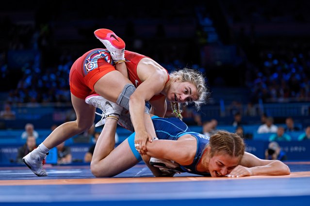 US' Helen Louise Maroulis (red) wrestles Ukraine's Alina Hrushyna Akobiia (Blue) in their women's freestyle 57kg wrestling quarter-final match at the Champ-de-Mars Arena during the Paris 2024 Olympic Games, in Paris on August 8, 2024. (Photo by Ritchie B. Tongo/EPA)