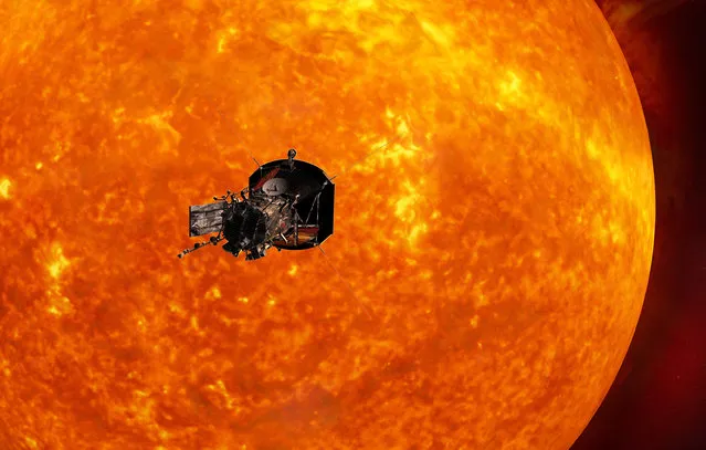 This image made available by the Johns Hopkins University Applied Physics Laboratory on Wednesday, May 31, 2017 depicts NASA's Solar Probe Plus spacecraft approaching the sun. On Wednesday, NASA announced it will launch the probe in summer 2018 to explore the solar atmosphere. It will be subjected to brutal heat and radiation like no other man-made structure before. (Photo by Johns Hopkins University Applied Physics Laboratory via AP Photo)