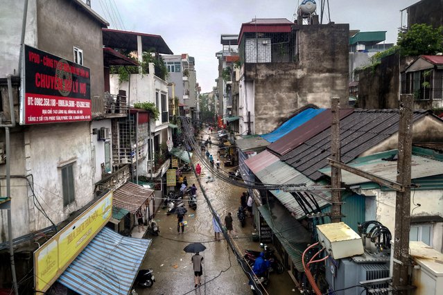 A generic view of a flooded street following the impact of Typhoon Yagi, in Hanoi, Vietnam on September 11, 2024. (Photo by Khanh Vu/Reuters)