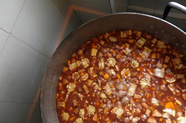 A soup for the students is pictured during an activity for the end of the school year at the Padre Jose Maria Velaz school in Caracas, Venezuela July 12, 2016. (Photo by Carlos Jasso/Reuters)