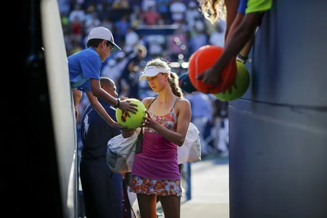 Mona Barthel of Germany signs autographs for fans after being defeated by Varvara Lepchenko of the U.S. in their third round match at the U.S. Open Championships tennis tournament in New York, September 5, 2015. (Photo by Eduardo Munoz/Reuters)