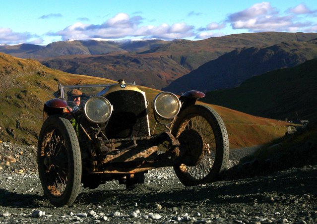 A motoring enthusiast drives a vintage car during the annual VSCC Lakeland Trial at Honister Slate Mine in Keswick, Britain on November 11, 2023. (Photo by Lee Smith/Reuters)