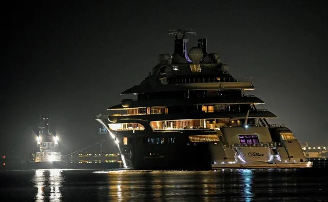 The 156 metre mega-yacht “Dilbar”, a luxury yacht, which authorities say belongs Russian-Uzbek billionaire Alisher Usmanov's sister and is also subject to sanctions, passses the harbour on its way from Hamburg to Bremen, in Bremerhaven Germany on September 21, 2022. (Photo by Fabian Bimmer/Reuters)